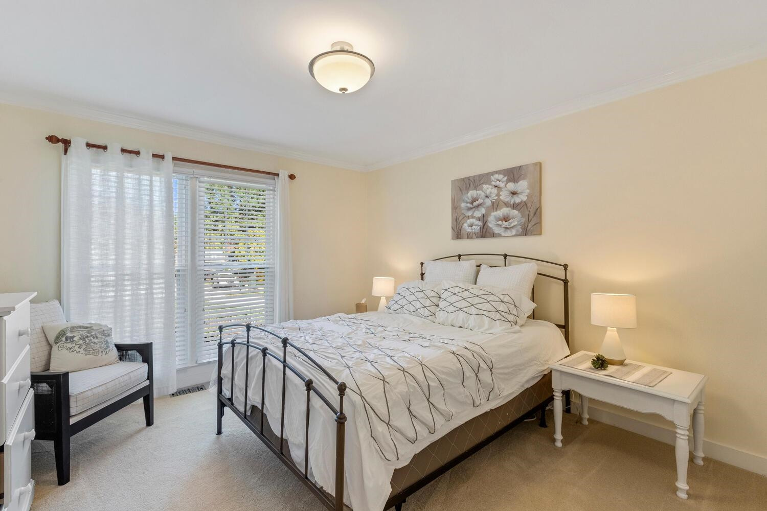 6600 Vancouver Lane Raleigh, NC 27615 - Photo 25 of 53 a bedroom with a bed and a couch