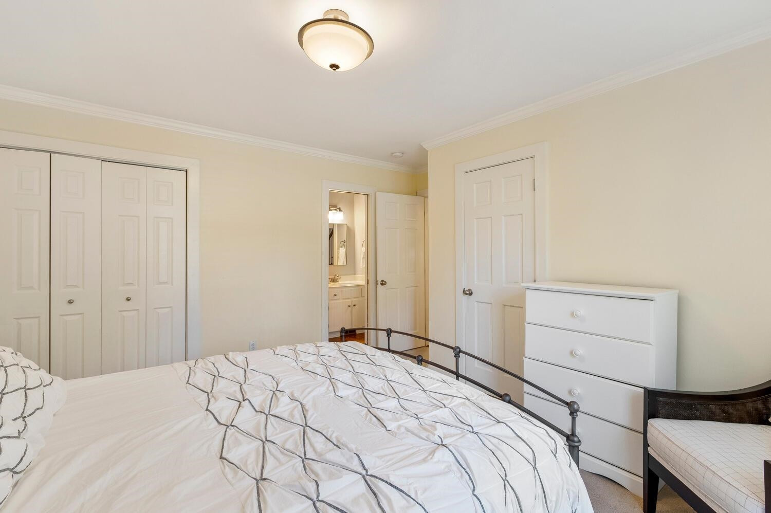 6600 Vancouver Lane Raleigh, NC 27615 - Photo 26 of 53 a bedroom with a bed and cabinets