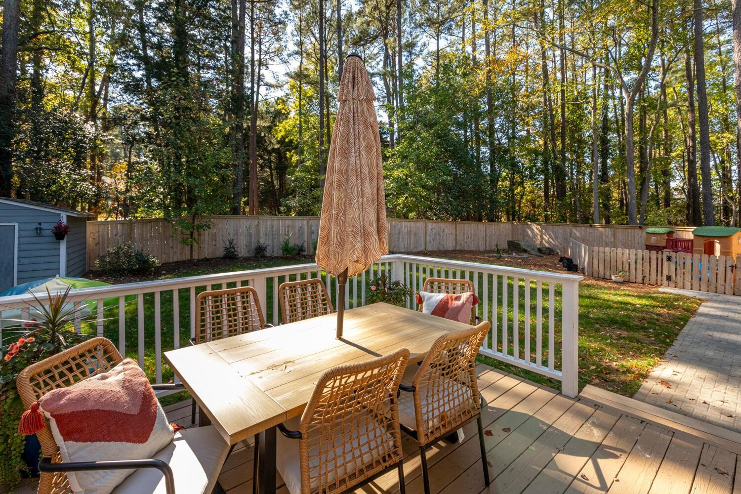 6600 Vancouver Lane Raleigh, NC 27615 - Photo 43 of 53 a view of a chairs and table in the patio