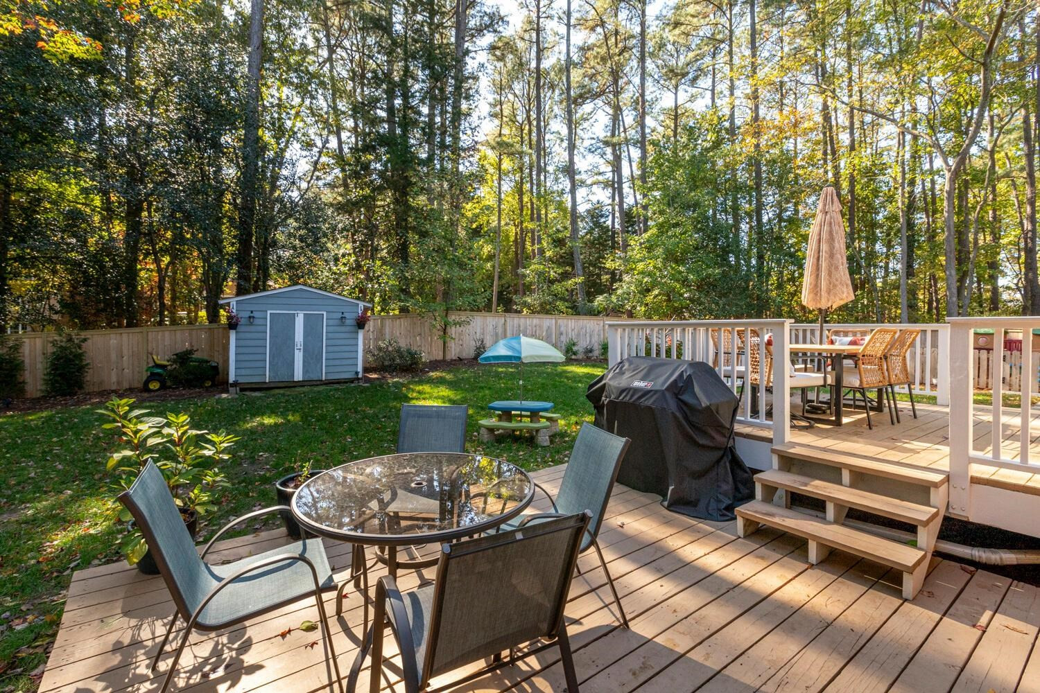 6600 Vancouver Lane Raleigh, NC 27615 - Photo 45 of 53 a view of a chairs and table in the patio