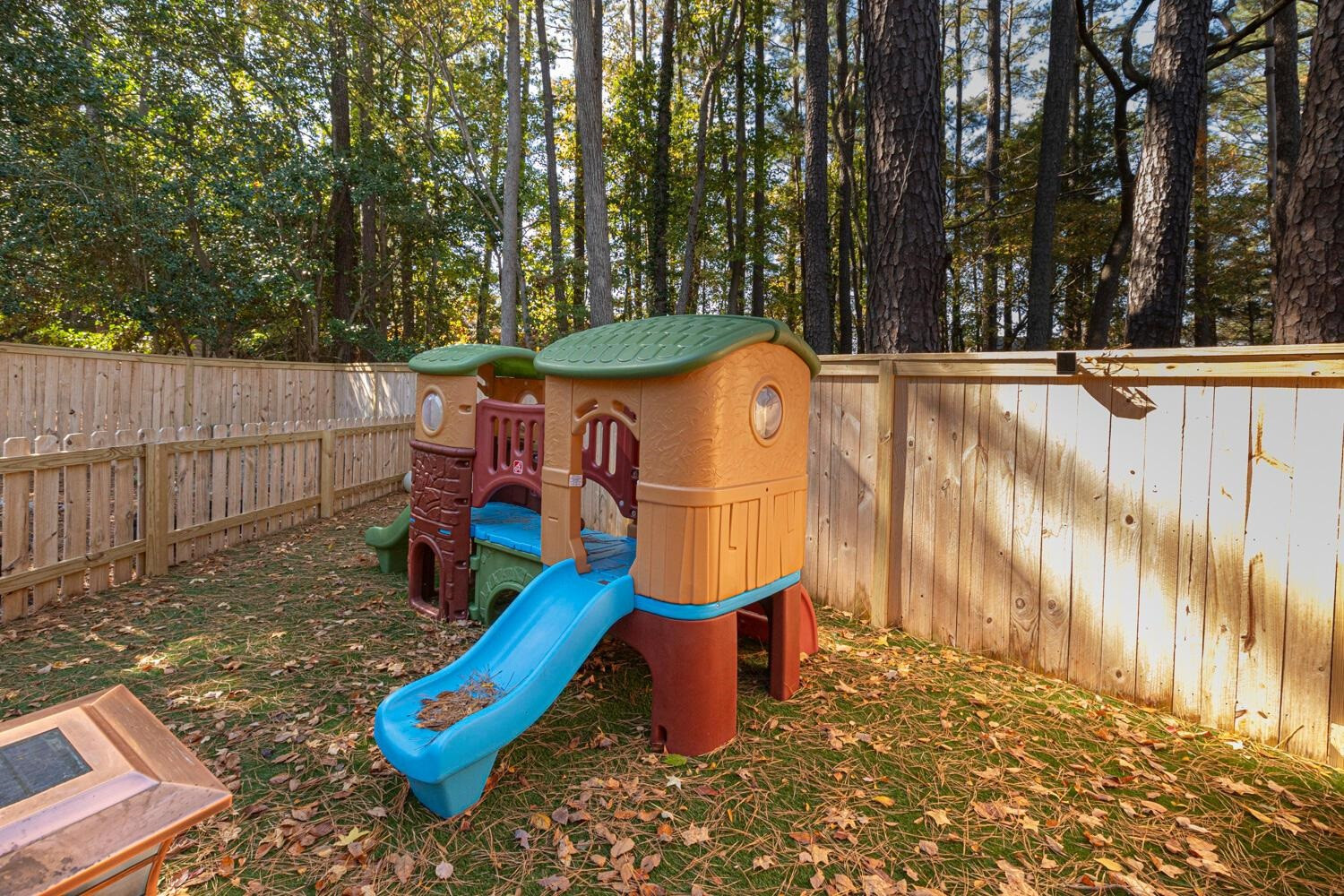 6600 Vancouver Lane Raleigh, NC 27615 - Photo 48 of 53 a view of outdoor space with shower and trees