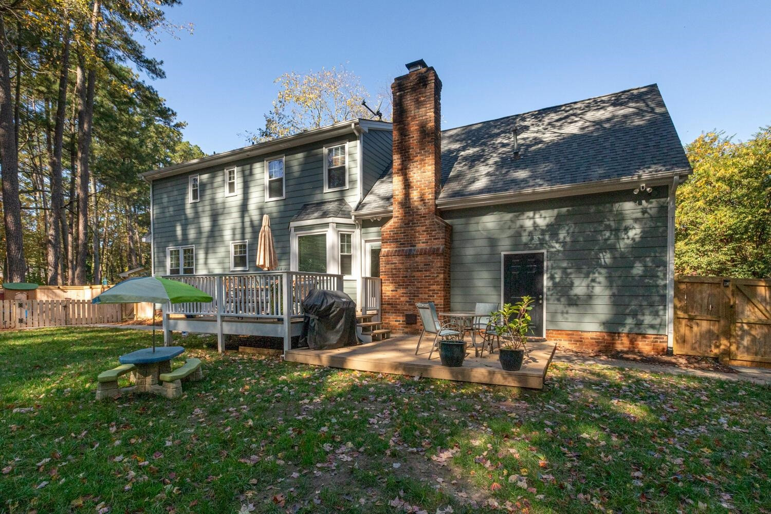 6600 Vancouver Lane Raleigh, NC 27615 - Photo 49 of 53 a front view of a house with garden