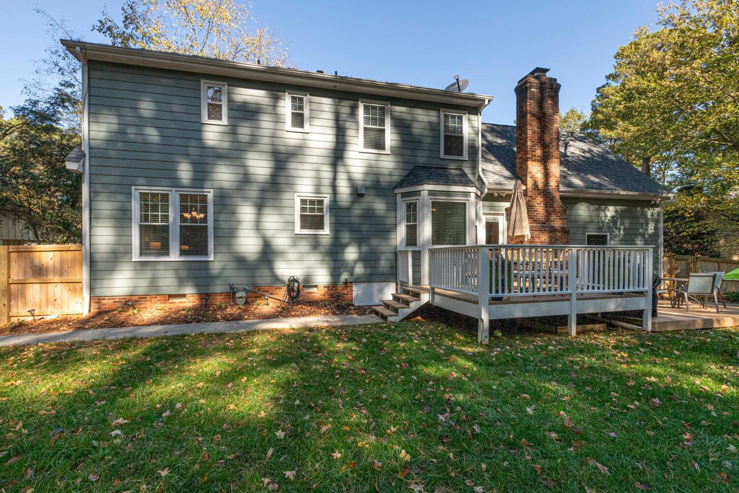 6600 Vancouver Lane Raleigh, NC 27615 - Photo 50 of 53 front view of a house with a yard