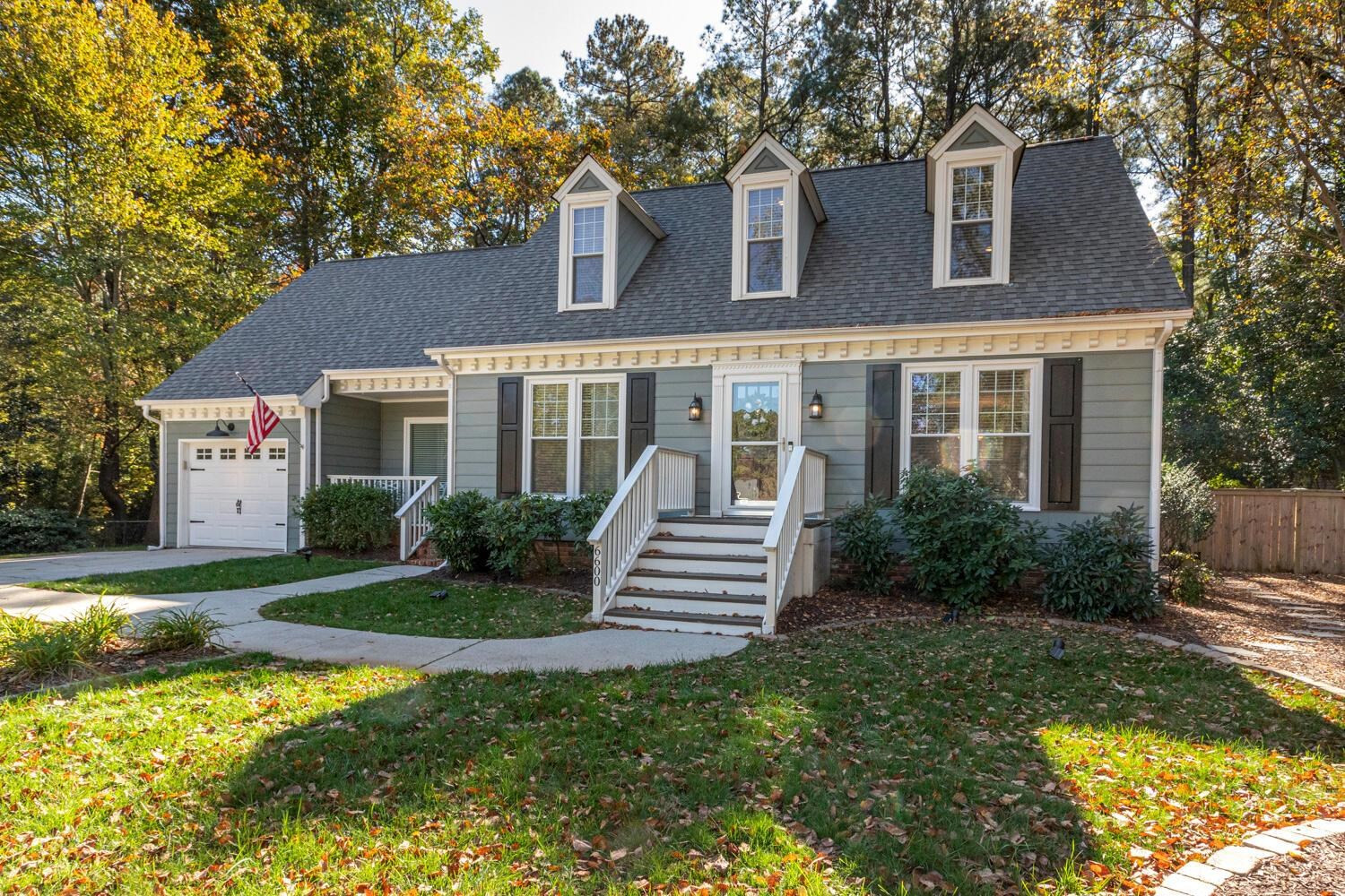 6600 Vancouver Lane Raleigh, NC 27615 - Photo 52 of 53 a front view of a house with a yard