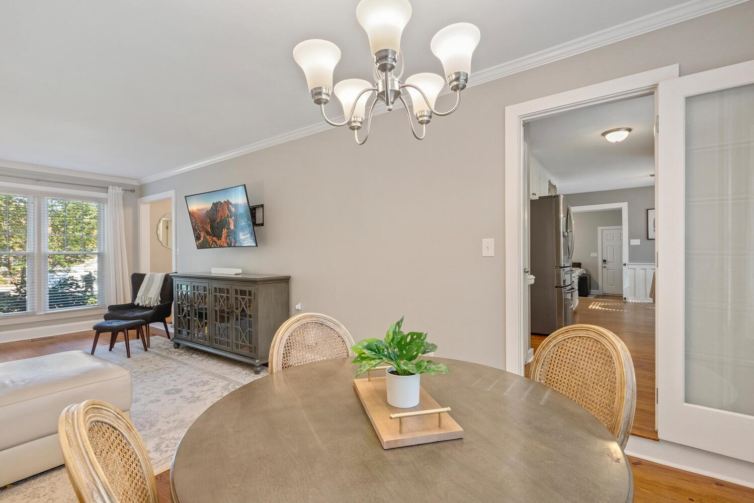 6600 Vancouver Lane Raleigh, NC 27615 - Photo 10 of 53 a living room with furniture chandelier and a fireplace
