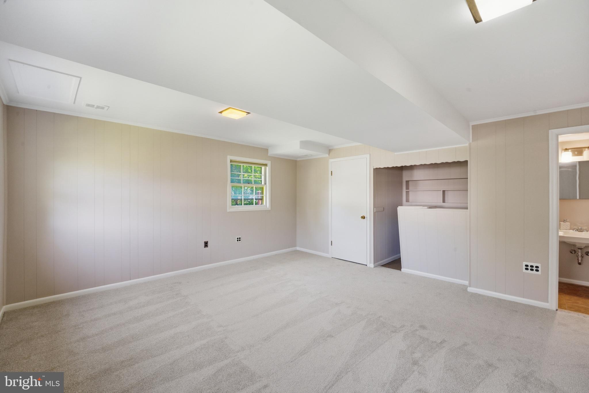 13309 Old Forge Road Silver Spring, MD 20904 - Photo 25 of 52 a view of an empty room with a window