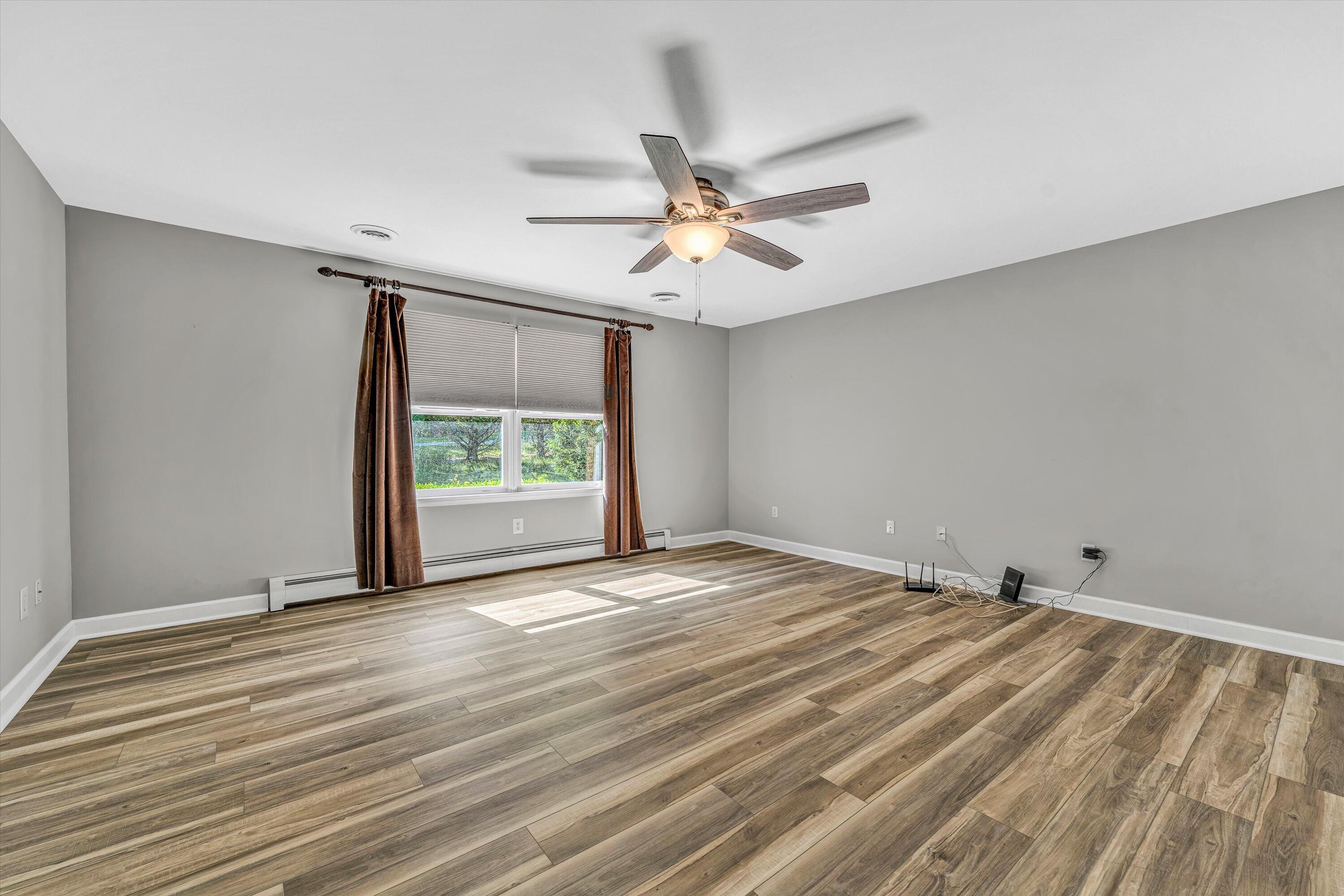 395 Middle Valley Road Hardy, VA 24101 - Photo 19 of 66 a view of an empty room with a window
