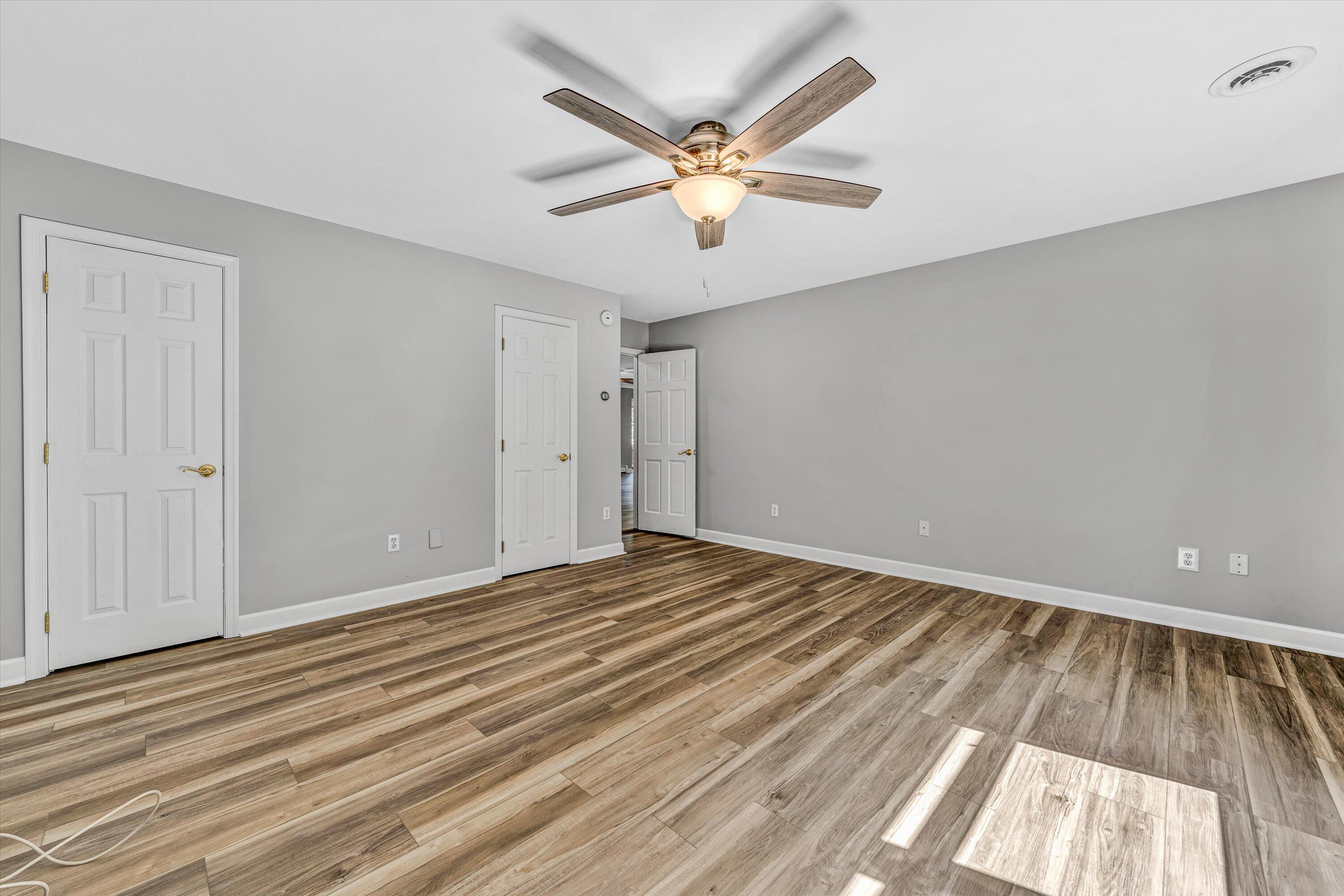 395 Middle Valley Road Hardy, VA 24101 - Photo 20 of 66 wooden floor in an empty room with a window