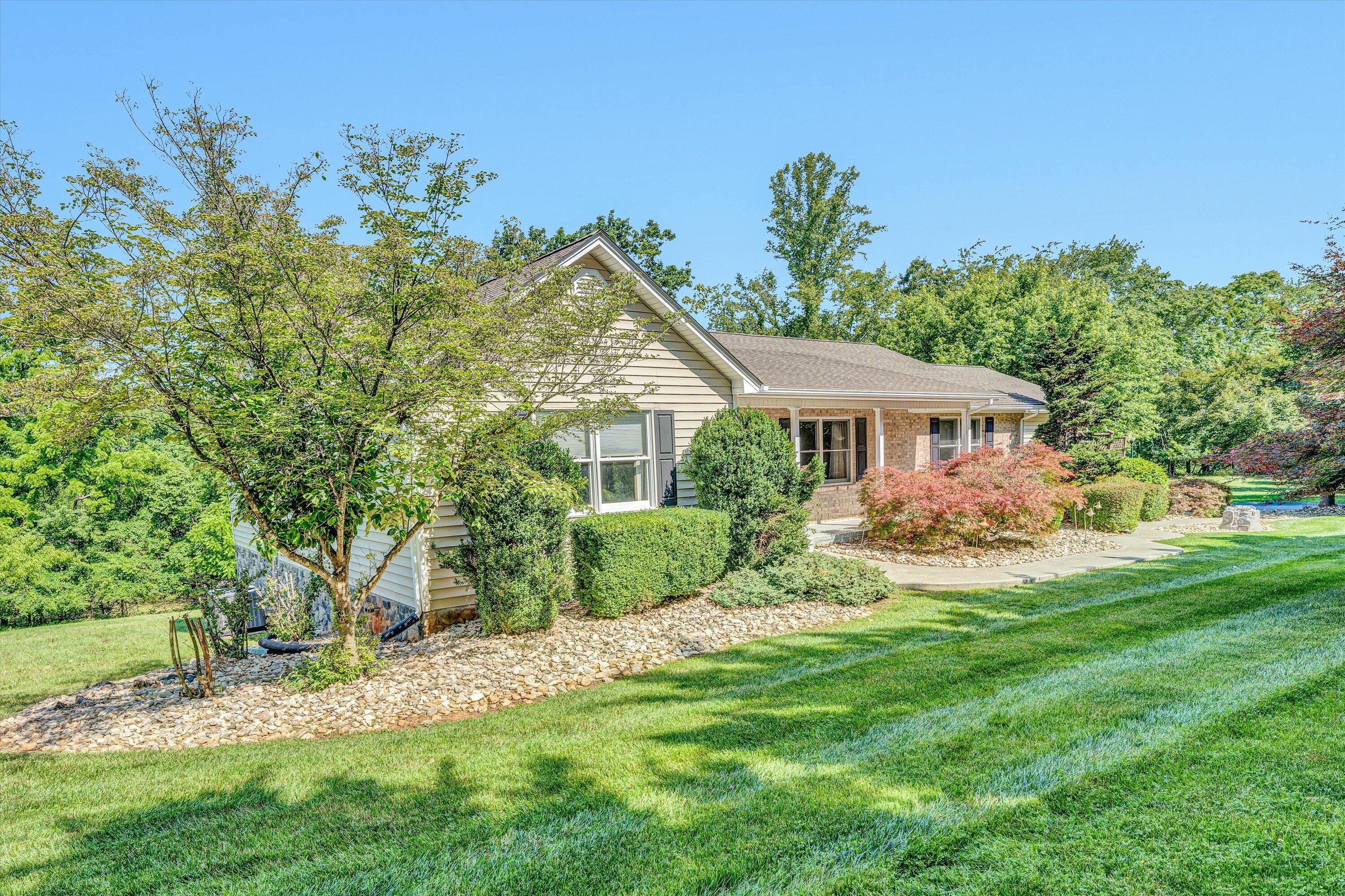 395 Middle Valley Road Hardy, VA 24101 - Photo 2 of 66 a view of a house with a yard