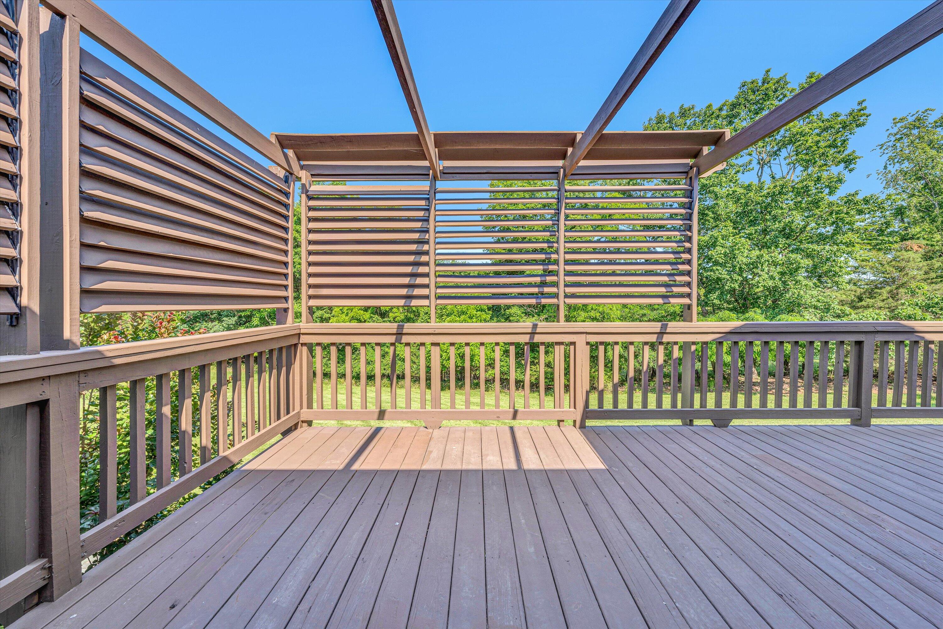 395 Middle Valley Road Hardy, VA 24101 - Photo 28 of 66 a view of a wooden balcony with a patio