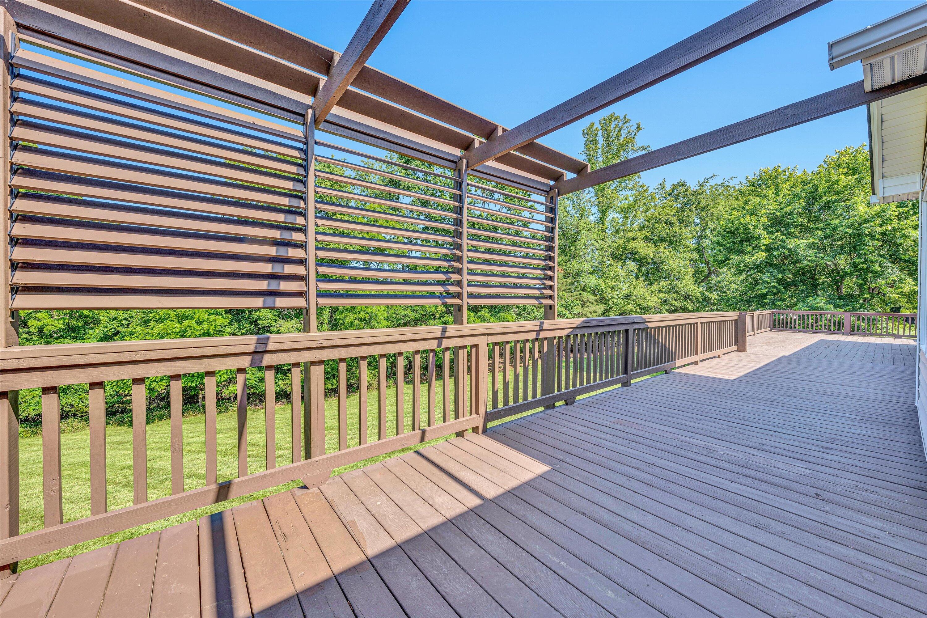 395 Middle Valley Road Hardy, VA 24101 - Photo 29 of 66 a balcony with wooden floor and fence