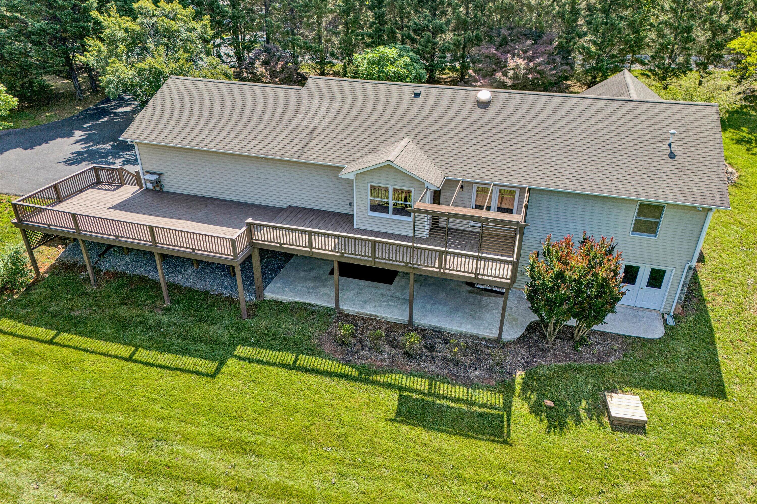 395 Middle Valley Road Hardy, VA 24101 - Photo 50 of 66 an aerial view of a house with swimming pool