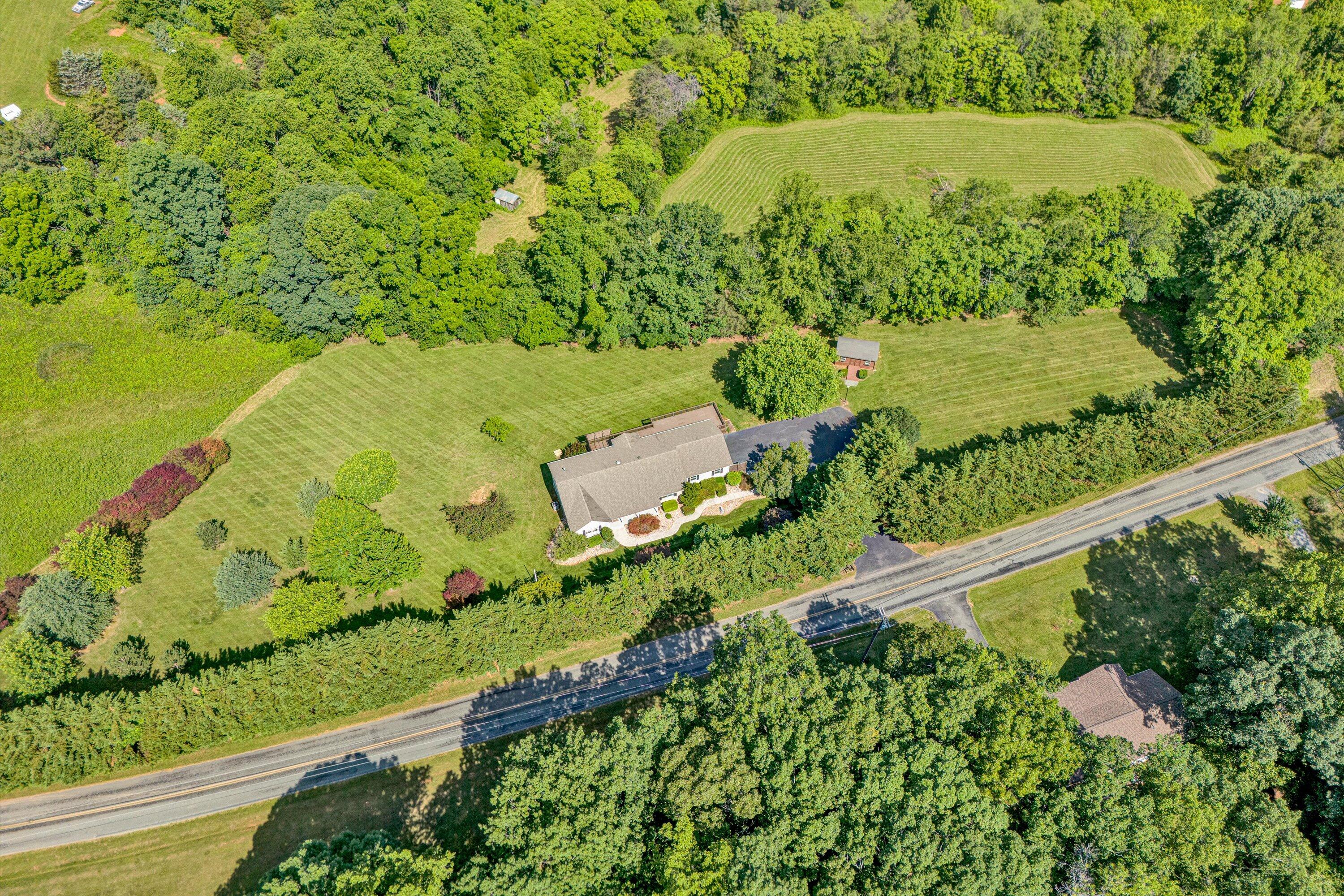 395 Middle Valley Road Hardy, VA 24101 - Photo 60 of 66 a view of a garden with a lake