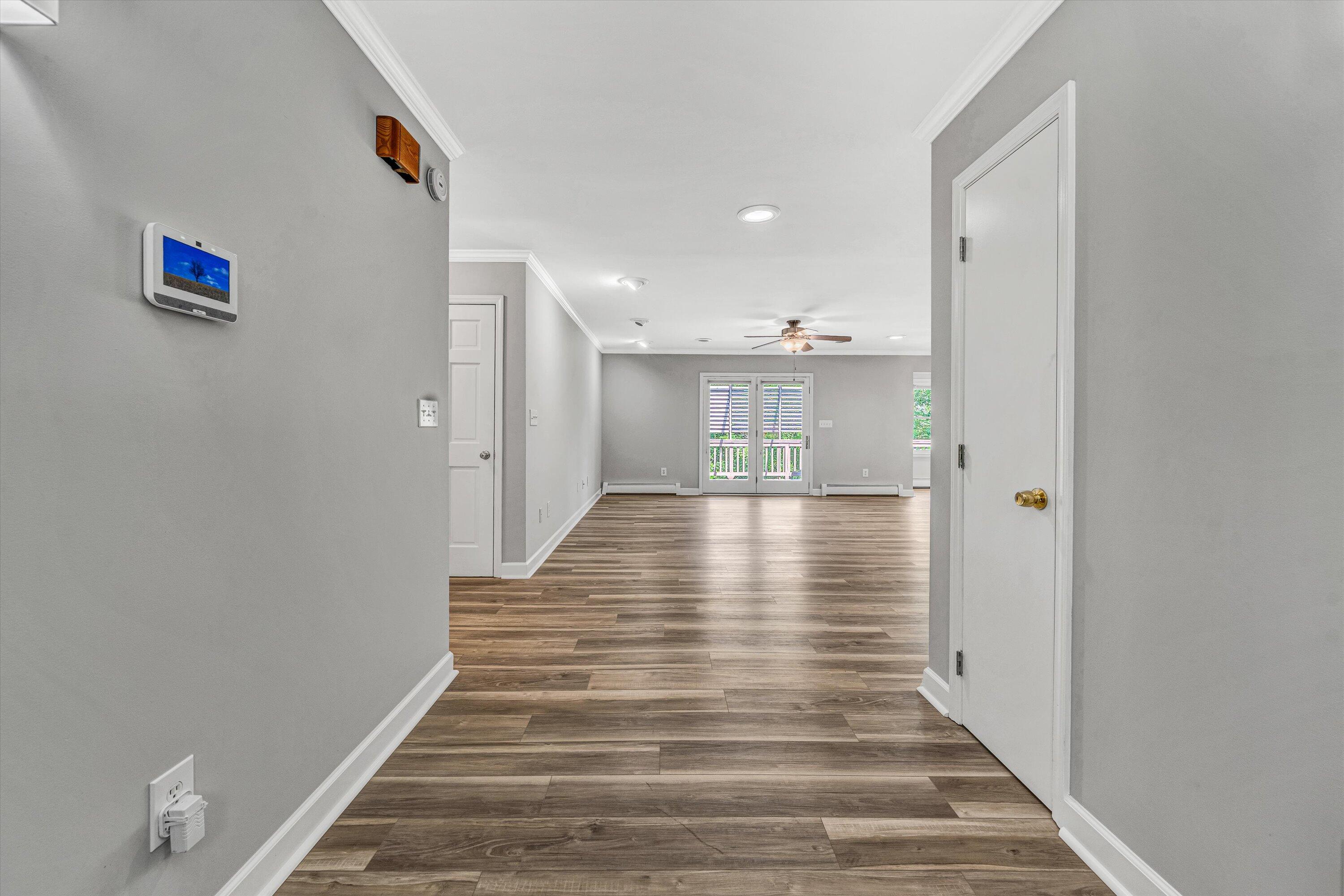 395 Middle Valley Road Hardy, VA 24101 - Photo 8 of 66 a view of entryway and hall with wooden floor