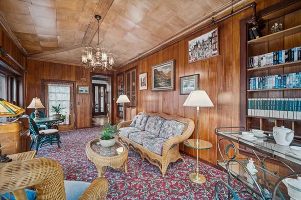 a kitchen with stainless steel appliances granite countertop a refrigerator a stove and a sink