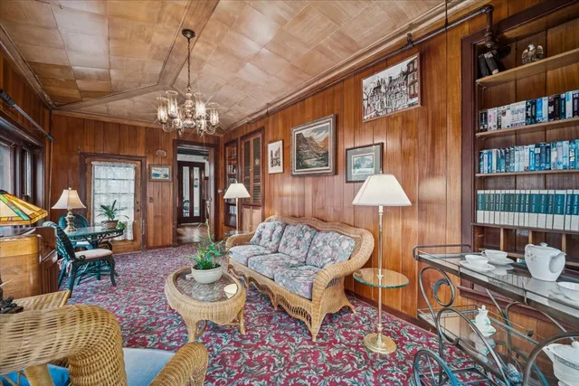 a kitchen with stainless steel appliances granite countertop a refrigerator a stove and a sink