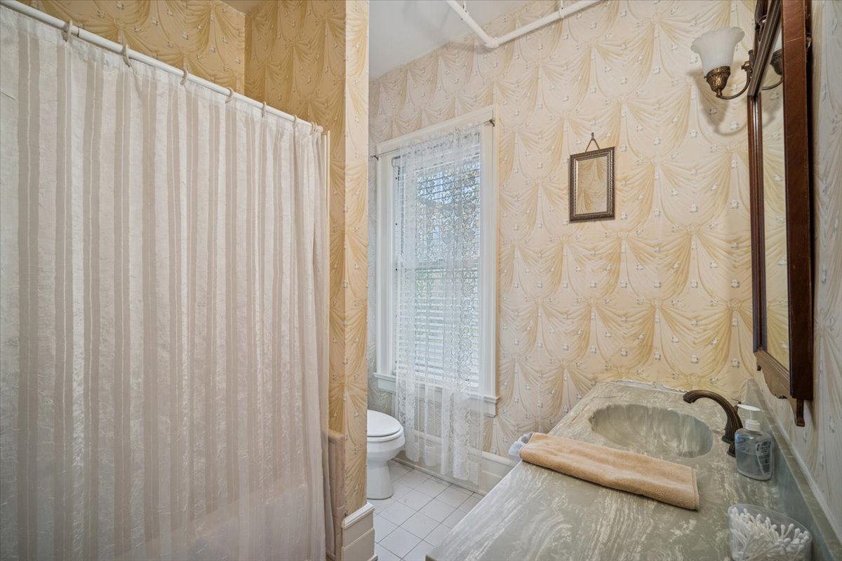 305 Oregon Avenue West Dundee, IL 60118 - Photo 29 of 68 a bathroom with a sink and toilet