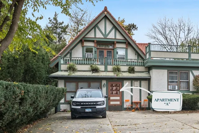 a kitchen with stainless steel appliances granite countertop a stove and a refrigerator