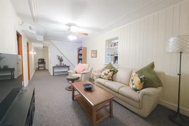 a very nice looking dining room with a table and chairs