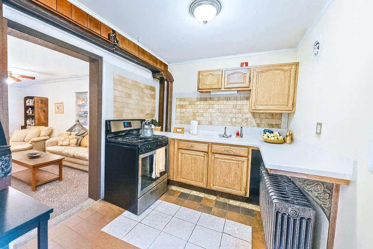 305 Oregon Avenue West Dundee, IL 60118 - Photo 41 of 68 a kitchen with stainless steel appliances granite countertop a stove a sink and a refrigerator