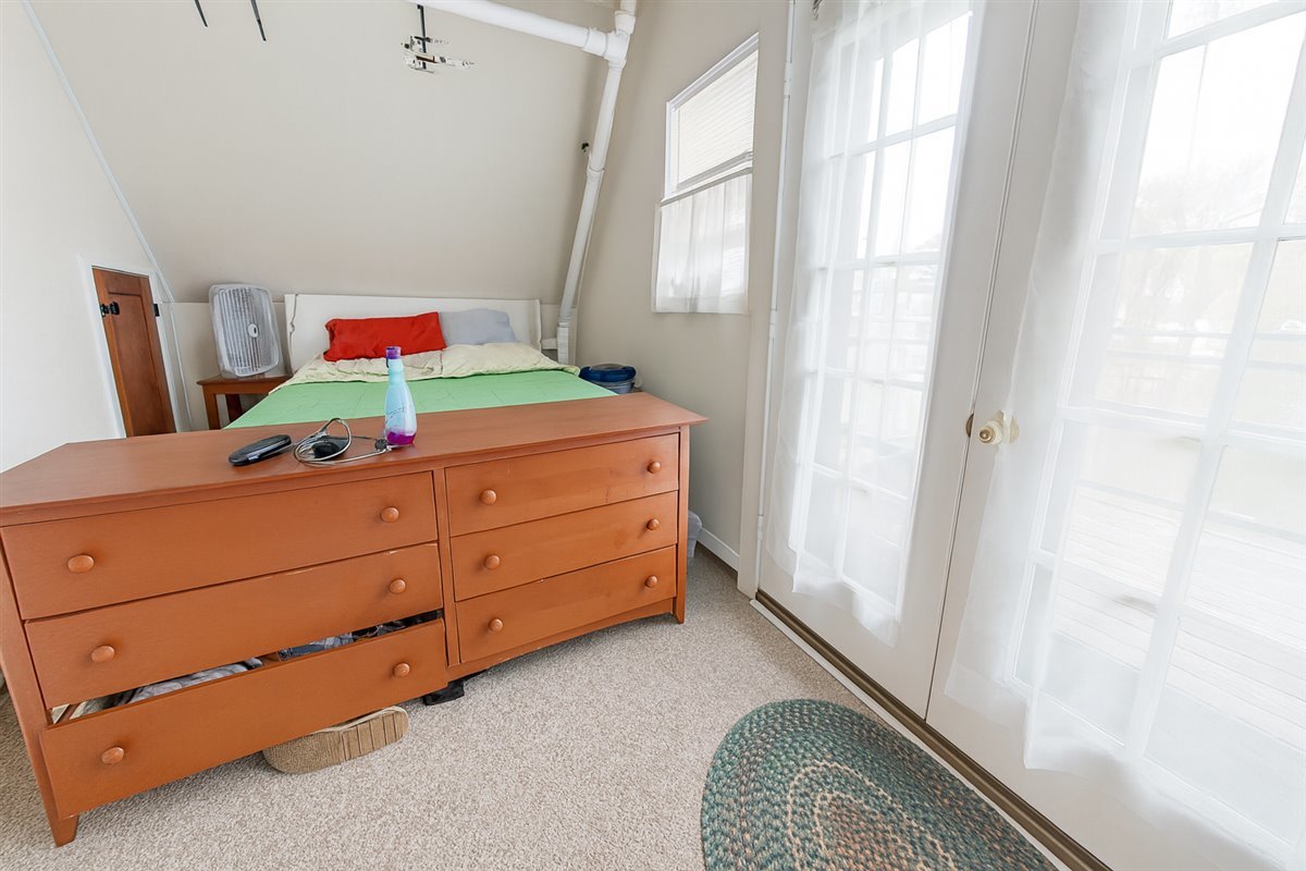 305 Oregon Avenue West Dundee, IL 60118 - Photo 52 of 68 a room with a dresser and a window