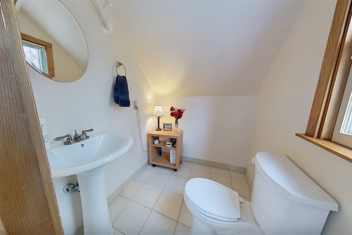 305 Oregon Avenue West Dundee, IL 60118 - Photo 55 of 68 a bathroom with a sink mirror vanity and toilet