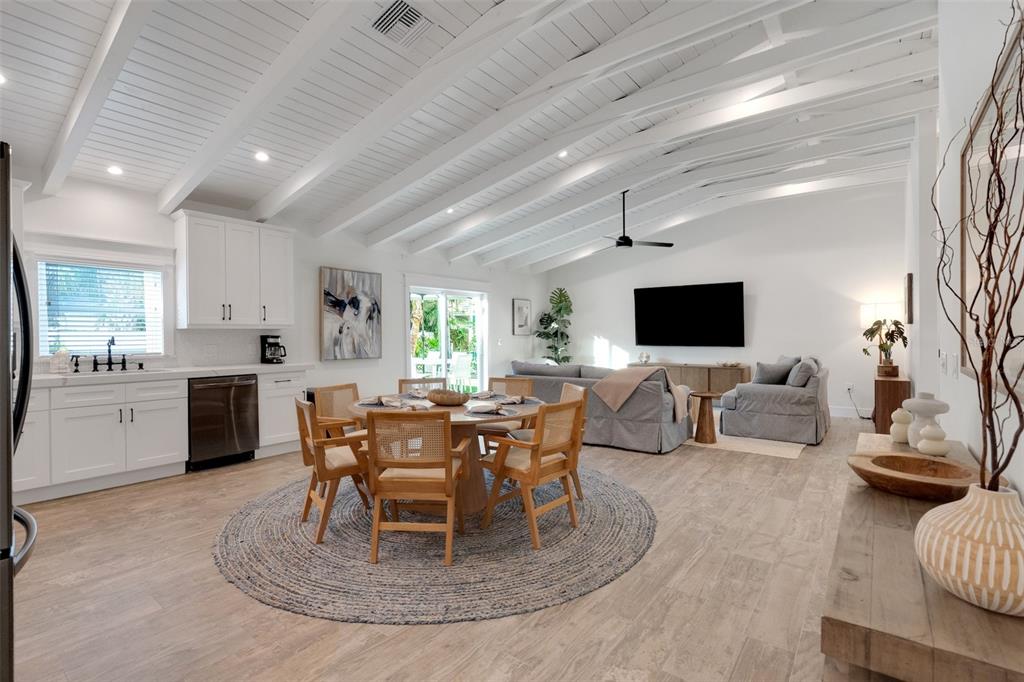 305 73rd Street Holmes Beach, FL 34217 - Photo 38 of 59 a view of a dining room with furniture