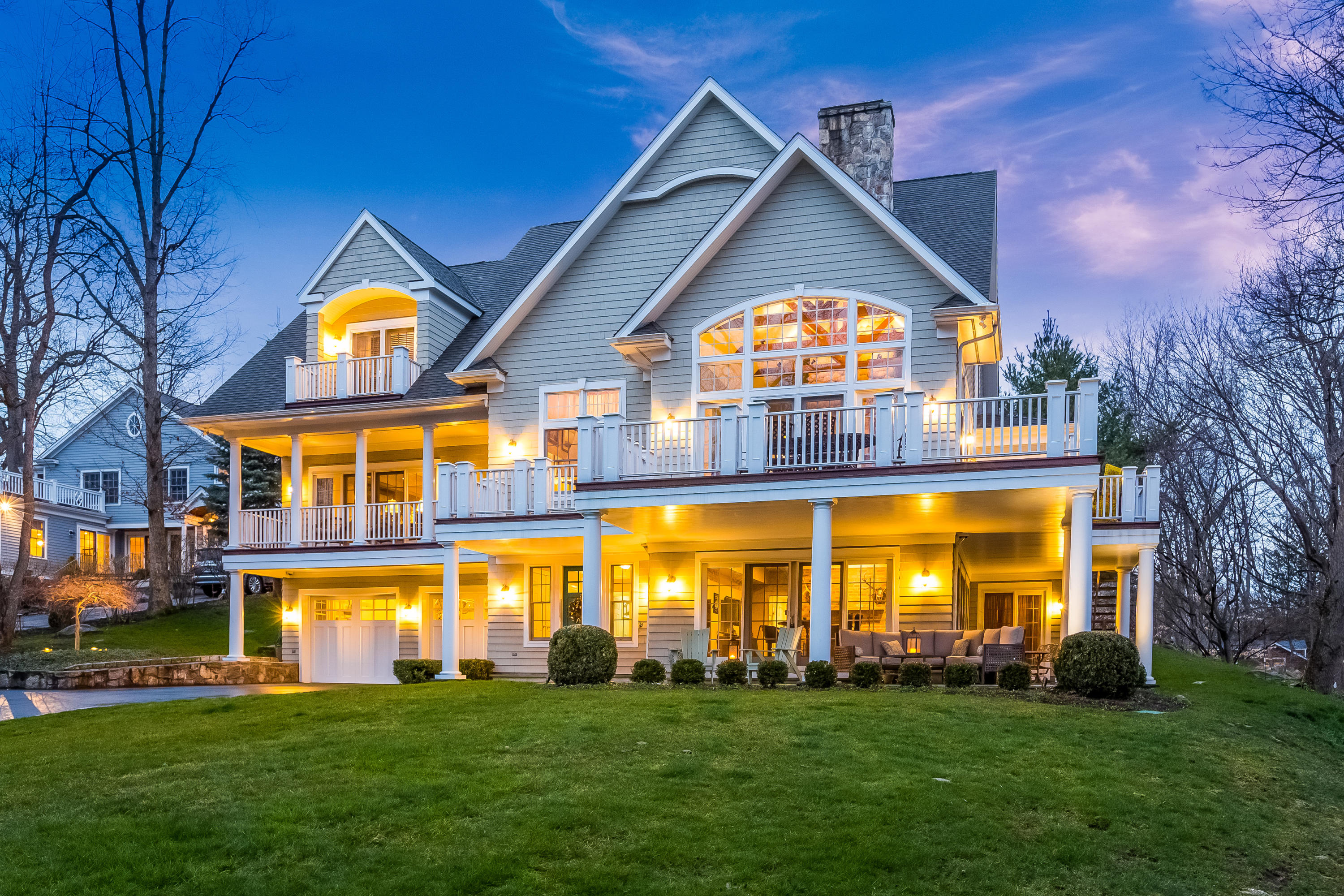 26 Indian Spring Road Rowayton, CT 06853 - Photo 2 of 33 a front view of a house with a big yard