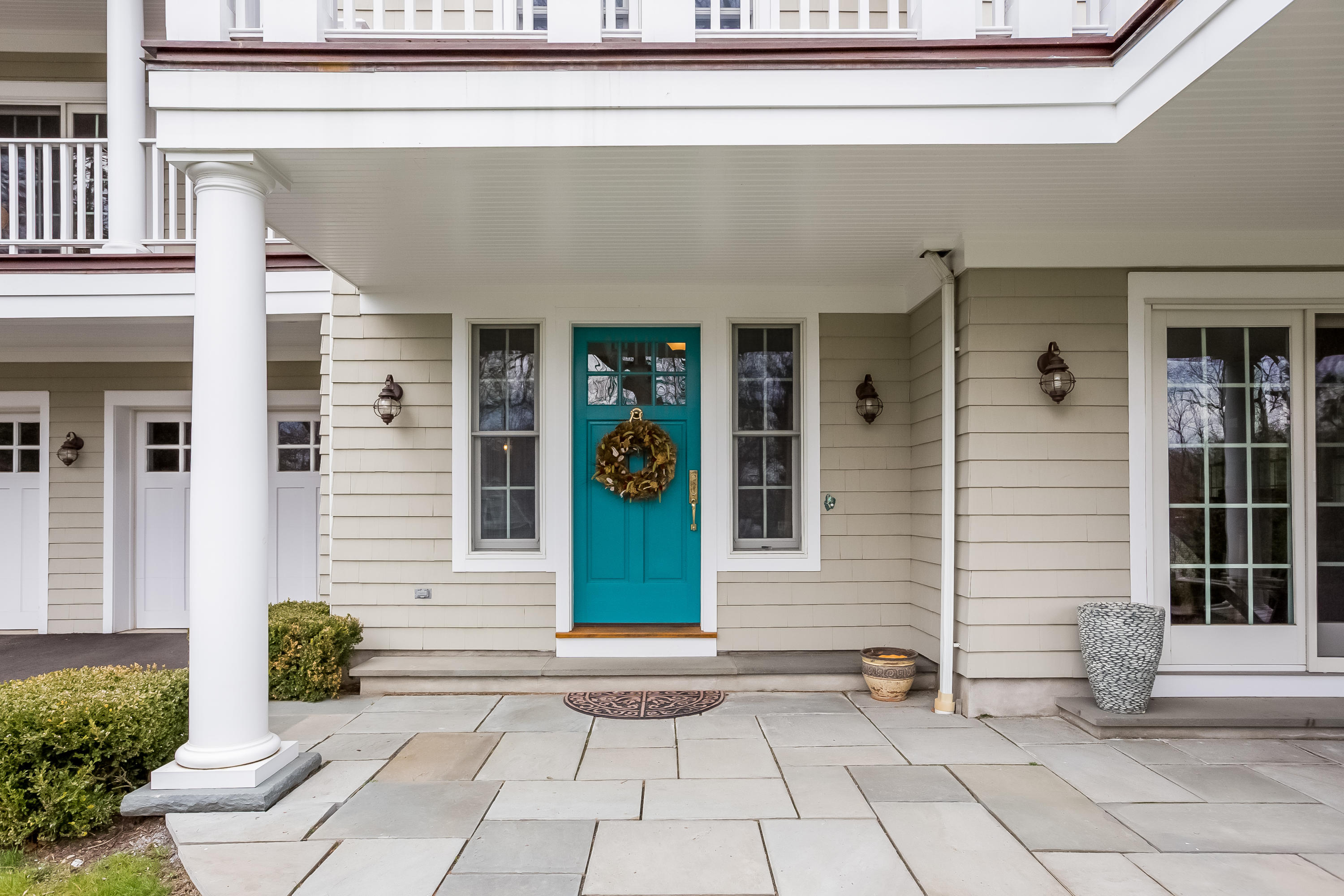 26 Indian Spring Road Rowayton, CT 06853 - Photo 3 of 33 a view of a house with potted plants