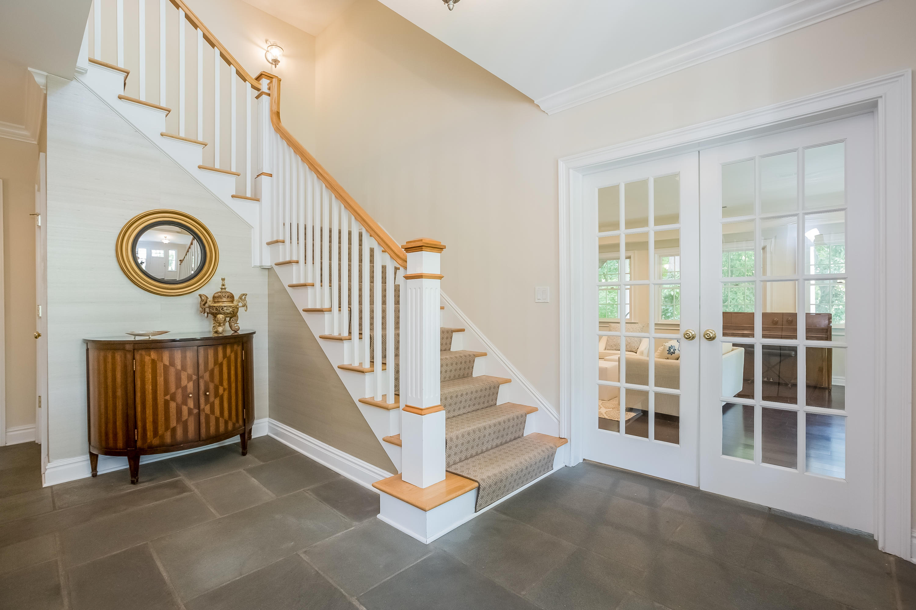 26 Indian Spring Road Rowayton, CT 06853 - Photo 4 of 33 a view of entryway with stairs and wooden floor
