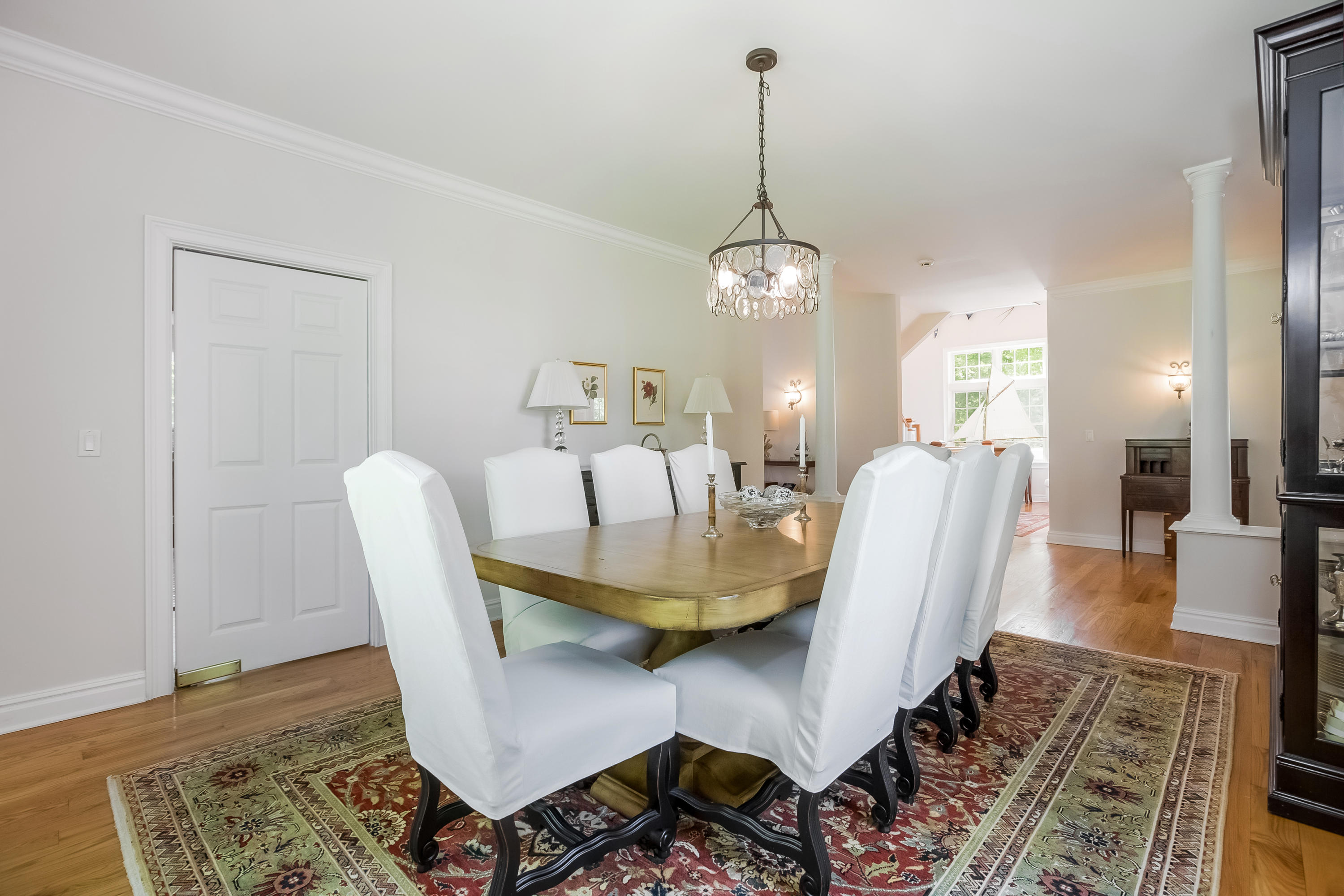 26 Indian Spring Road Rowayton, CT 06853 - Photo 8 of 33 a view of a dining room with furniture
