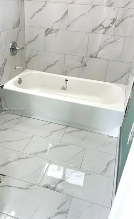 a bathroom with a bathtub