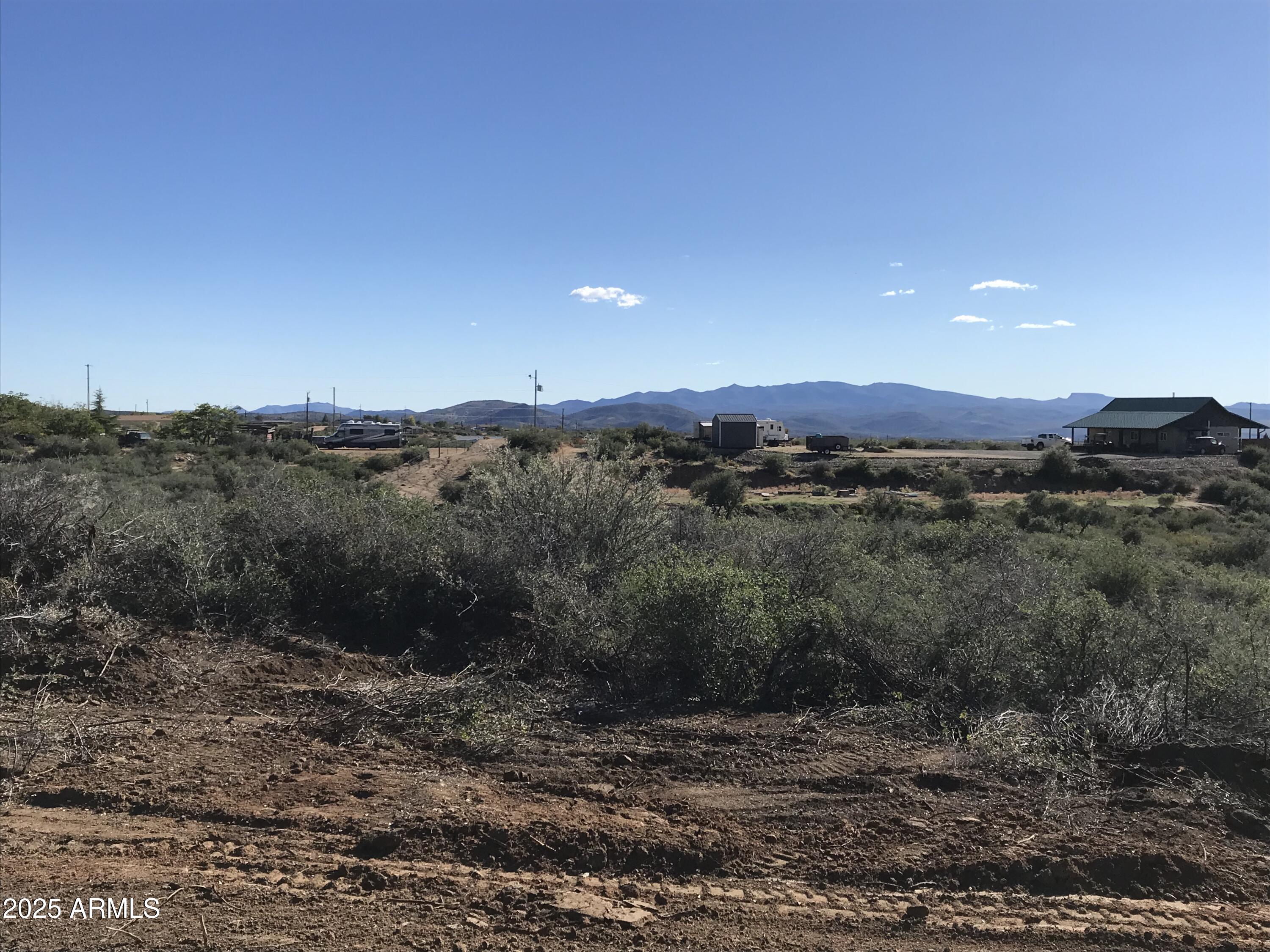8335 West Barrington Road, Unit 107 Wilhoit, AZ 86332 - Photo 5 of 13 a view of a mountain
