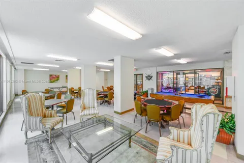 a view of a living room with furniture