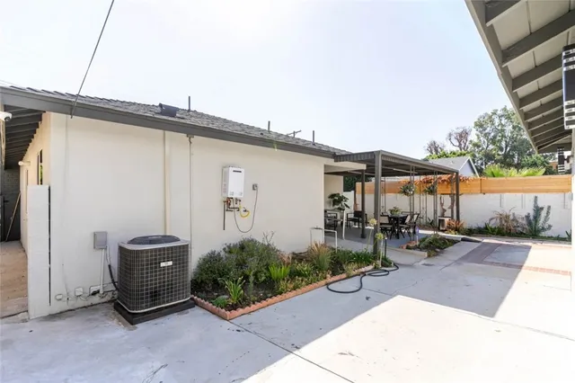 a backyard of a house with seating space