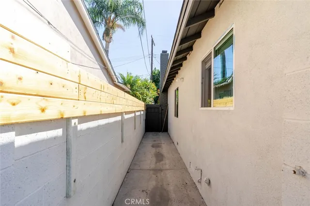 a view of a house with a small yard