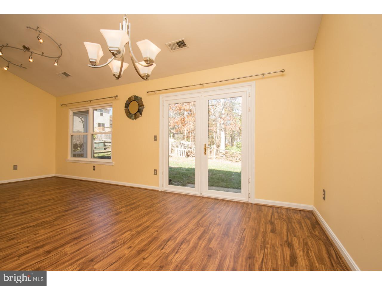 415 Spring Ridge Court Sterling, VA 20164 - Photo 13 of 49 Living/Dining area opens to back yard