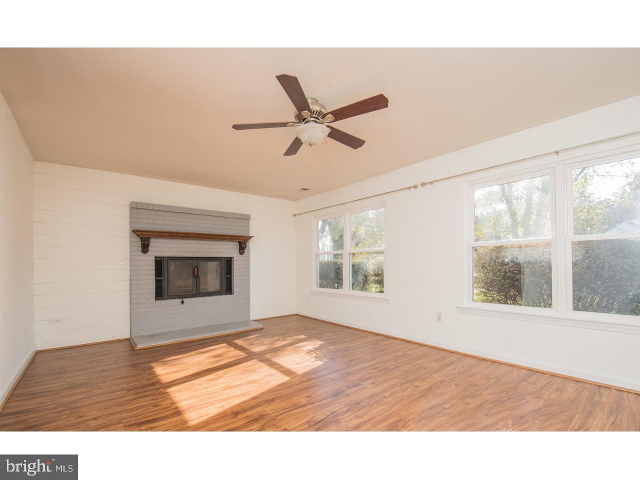 415 Spring Ridge Court Sterling, VA 20164 - Photo 16 of 49 Family Room with fire place on the lower split