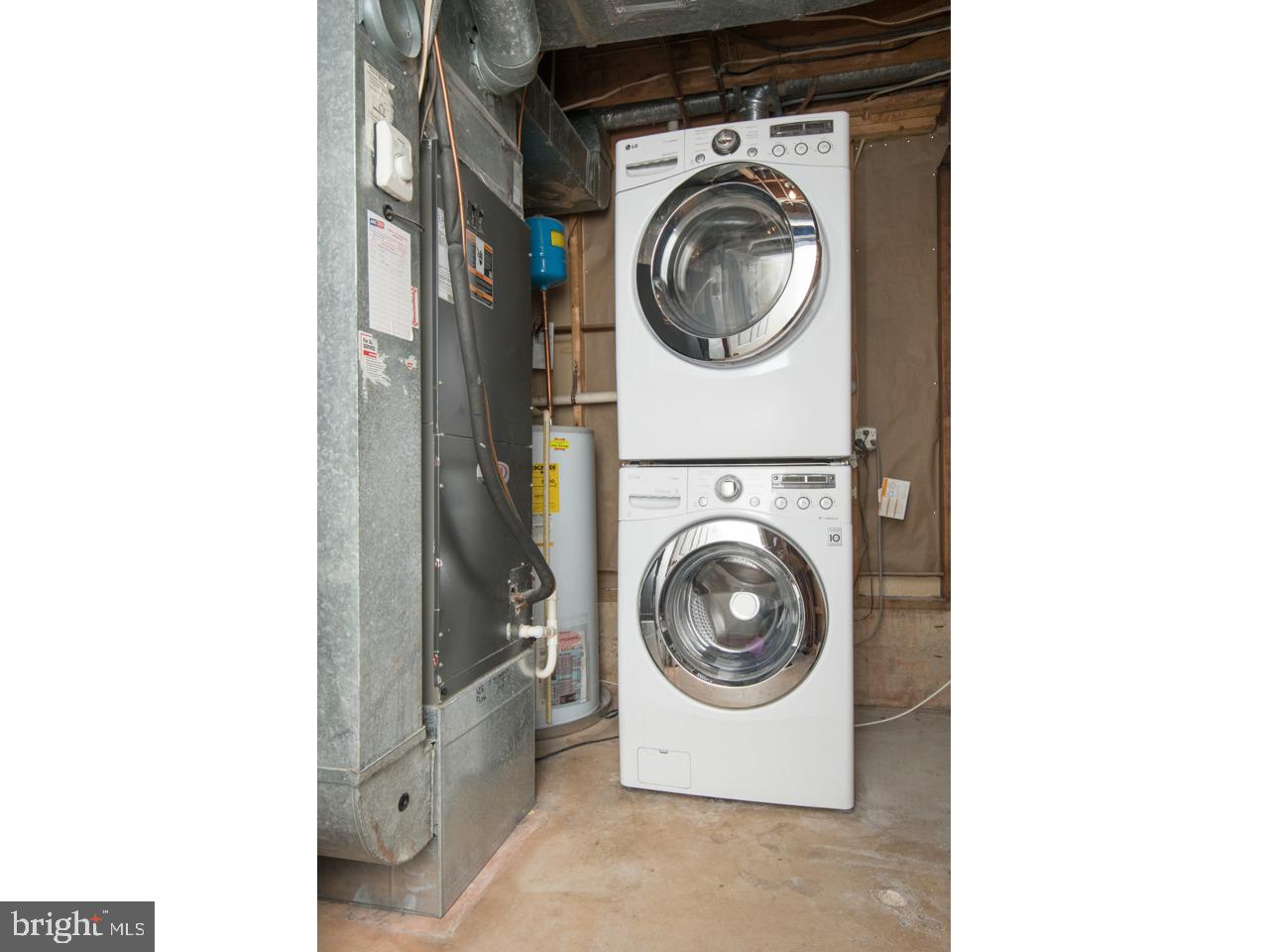 415 Spring Ridge Court Sterling, VA 20164 - Photo 43 of 49 Washer/Dryer in mechanical room