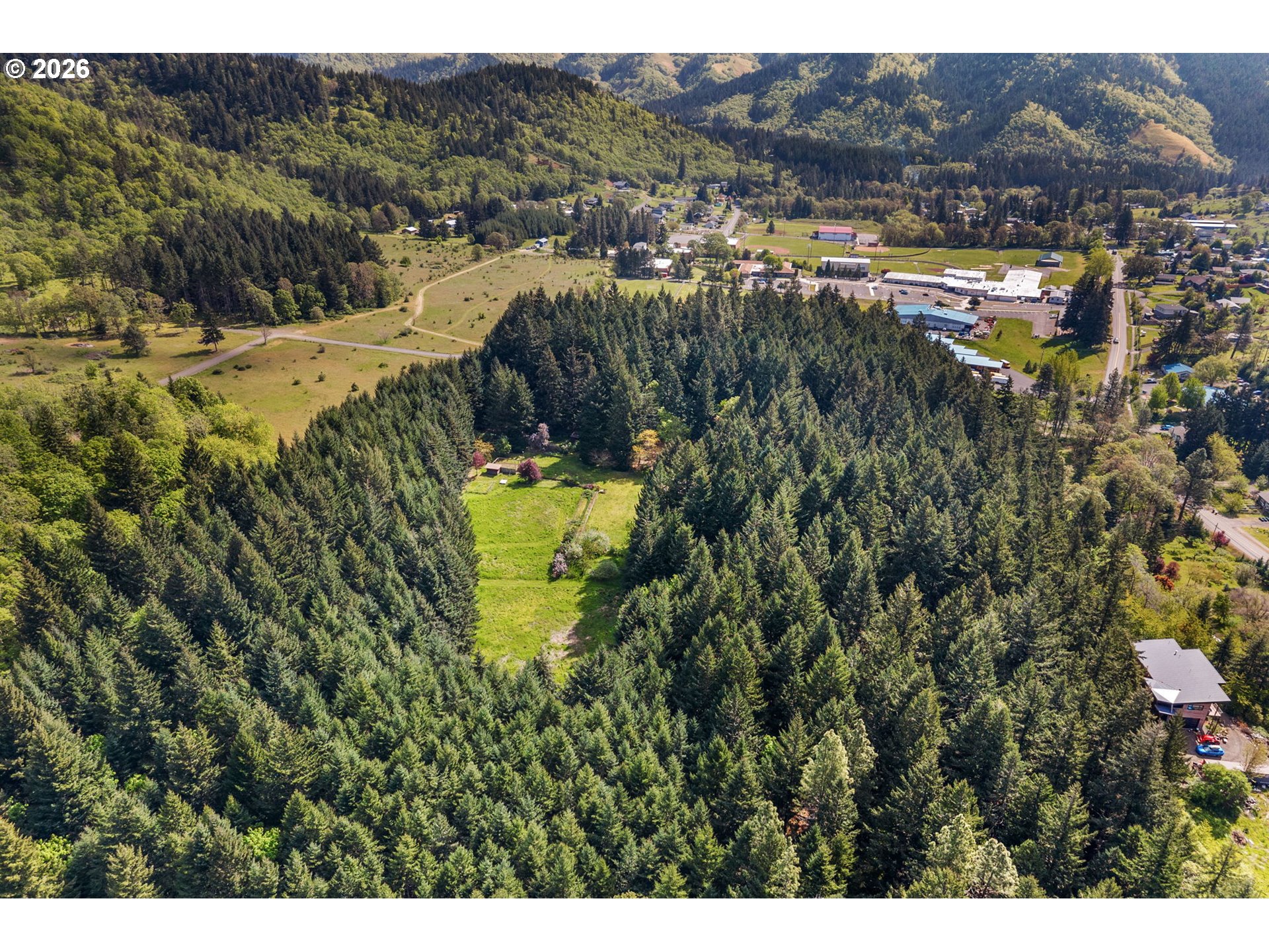 586 Northwest Loop Road White Salmon, WA 98672 - Photo 2 of 48 a view of a town with mountains in the background