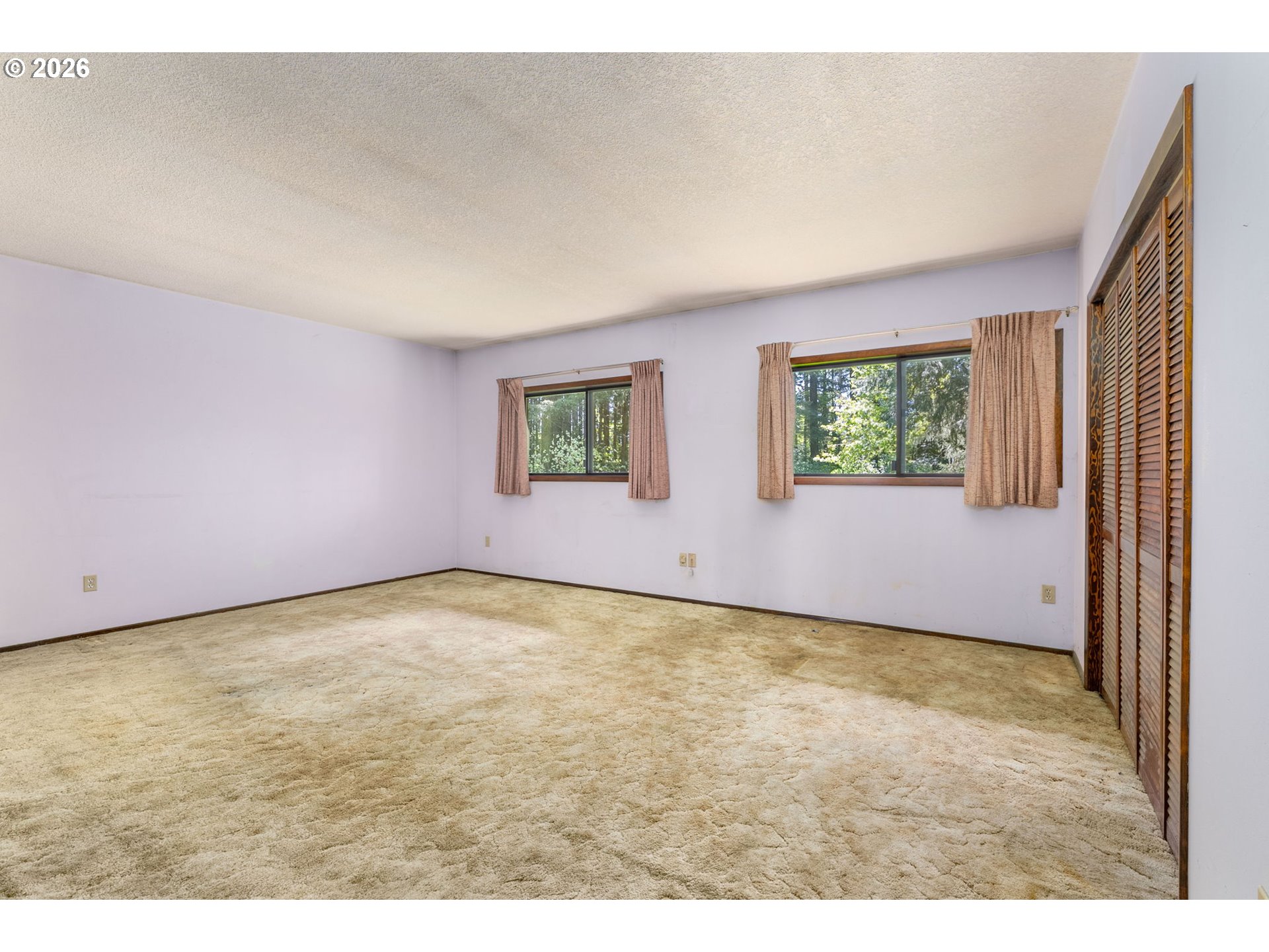 586 Northwest Loop Road White Salmon, WA 98672 - Photo 24 of 48 a view of an empty room with a window