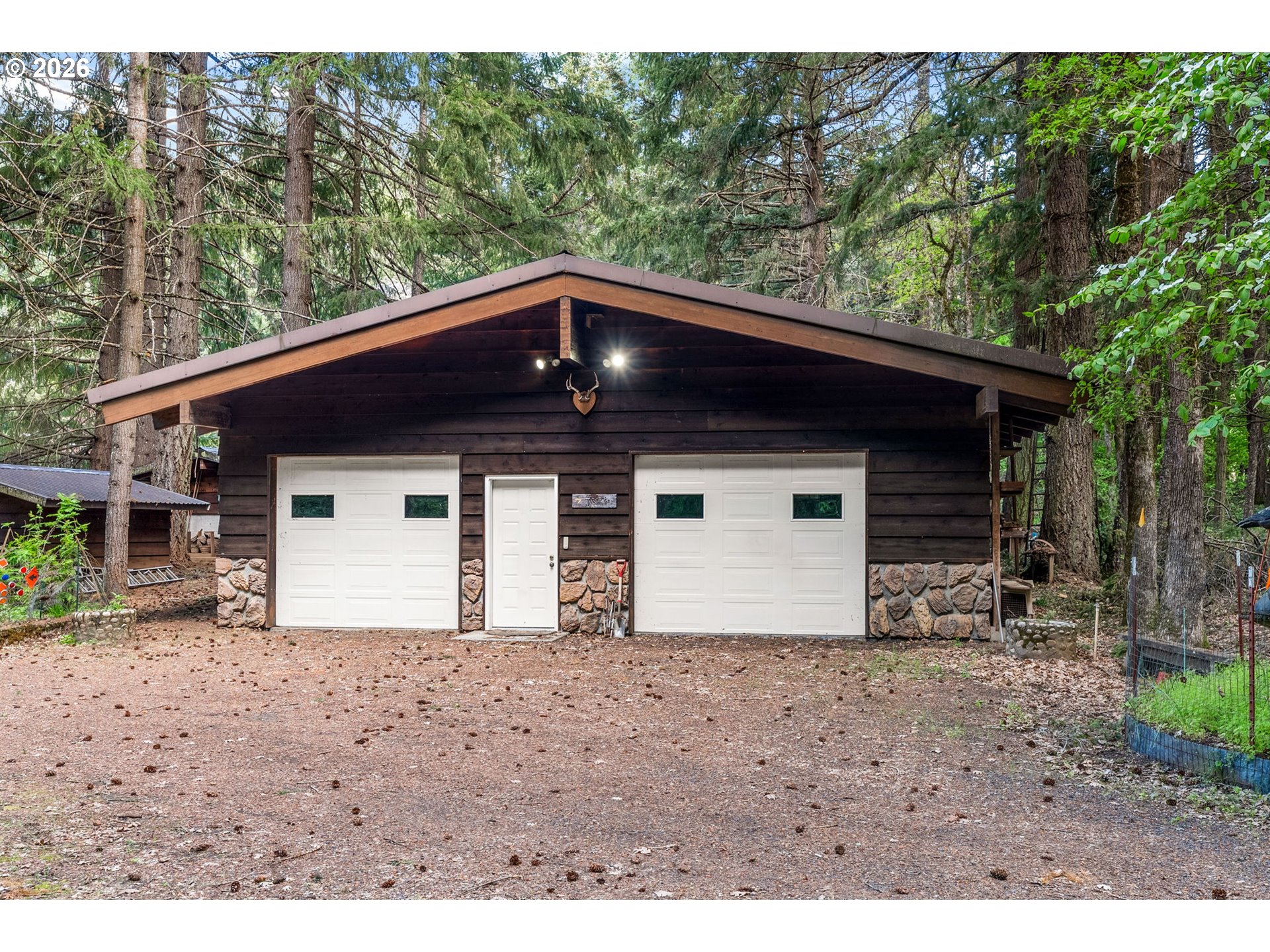 586 Northwest Loop Road White Salmon, WA 98672 - Photo 33 of 48 a view of a house with a yard