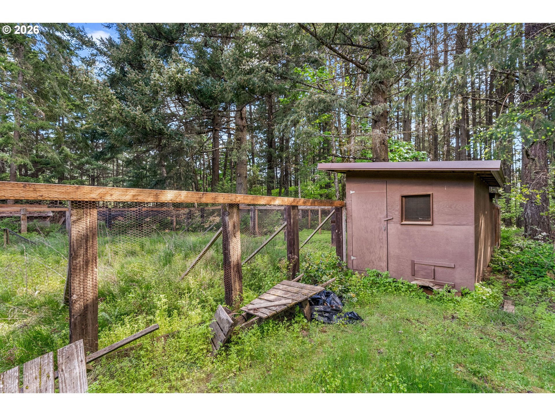 586 Northwest Loop Road White Salmon, WA 98672 - Photo 39 of 48 a view of a tiny house with a yard