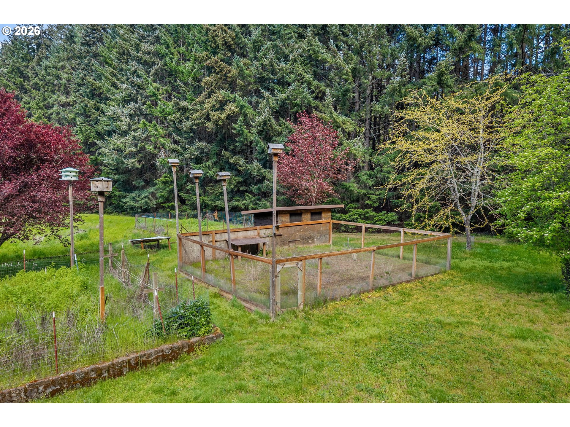 586 Northwest Loop Road White Salmon, WA 98672 - Photo 42 of 48 a view of a house with a backyard