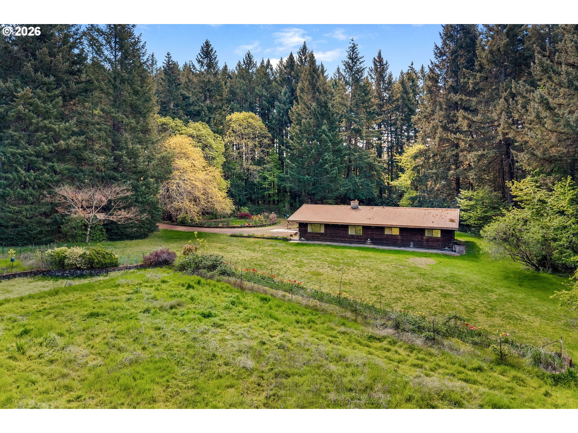 586 Northwest Loop Road White Salmon, WA 98672 - Photo 43 of 48 a view of a house with a yard