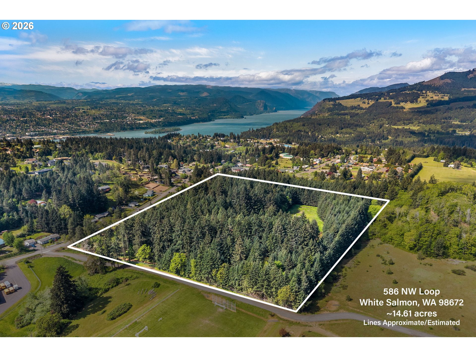 586 Northwest Loop Road White Salmon, WA 98672 - Photo 46 of 48 a view of a lake from a balcony