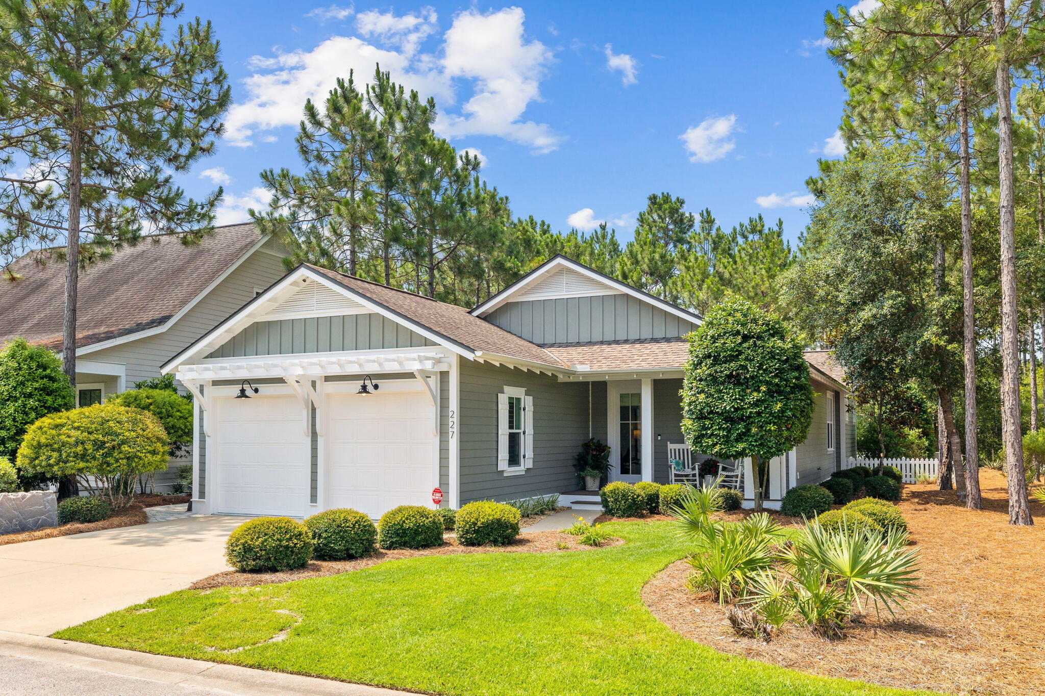 227 Jack Knife Drive Inlet Beach, FL 32461 - Photo 2 of 54 a front view of a house with a yard