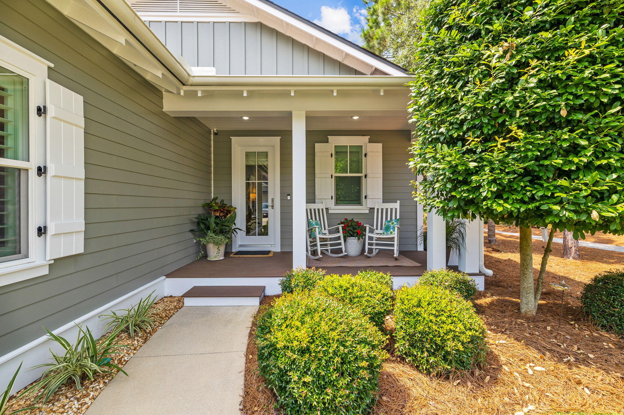 227 Jack Knife Drive Inlet Beach, FL 32461 - Photo 6 of 54 a front view of a house with garden