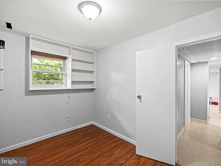 5007 Odessa Road College Park, MD 20740 - Photo 19 of 20 a view of a room with wooden floor and window