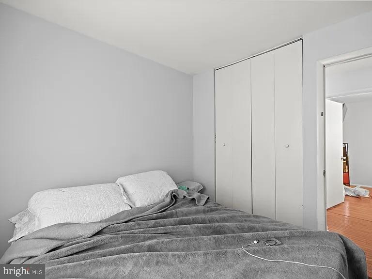 5007 Odessa Road College Park, MD 20740 - Photo 9 of 20 a bedroom with a bed and a window